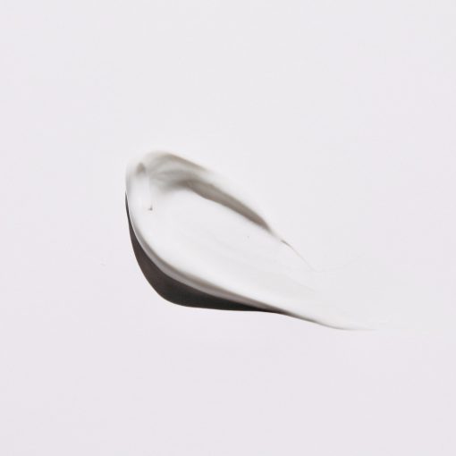 stainless steel spoon on white surface