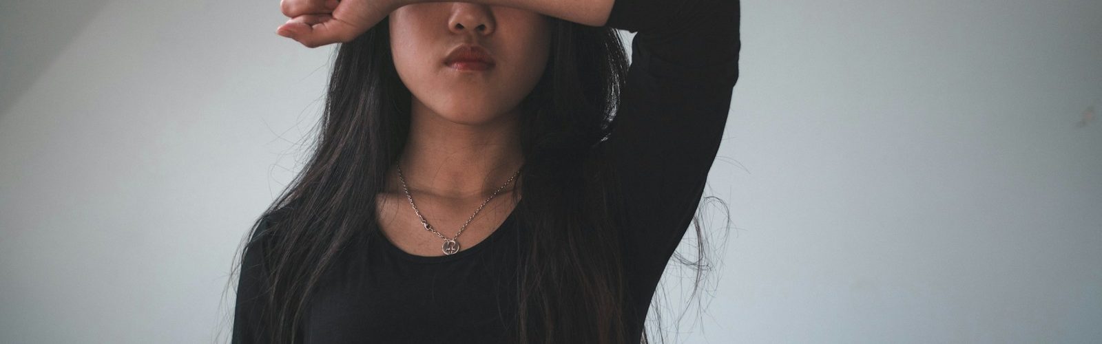 woman in black long sleeve shirt