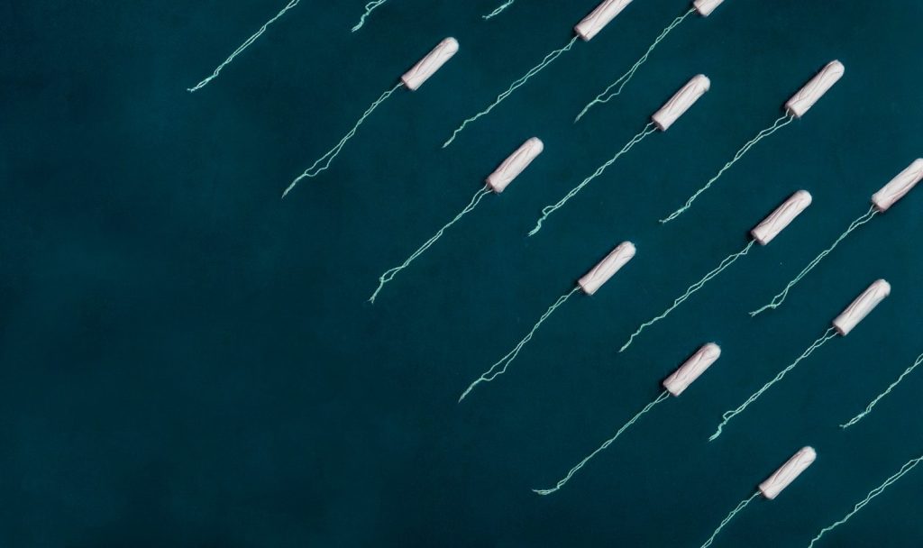 white strings on blue surface