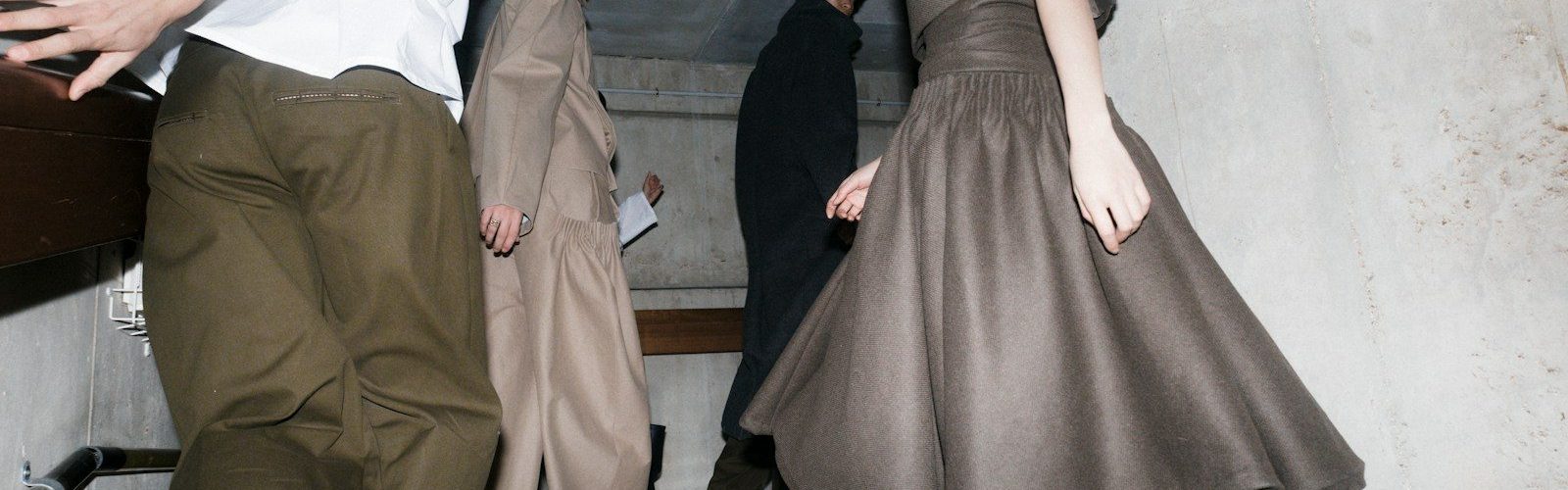 People are descending a staircase together.